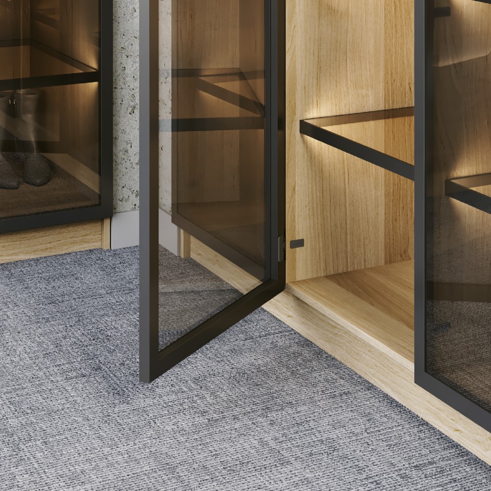 Close-up of framed glass and wood ZOBAL furniture fronts