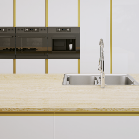 Kitchen worktop with the ZOBAL handleless system and gold trim